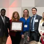 Alvine Wins Alumni Award