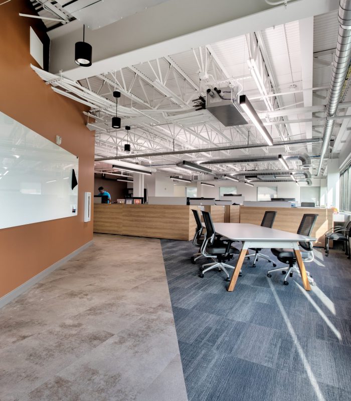 Interior shot of Alvine Engineering's Oklahoma City office's collaboration area with a white board